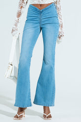 CINCHED UP DENIM PANTS IN MEDIUM WASH