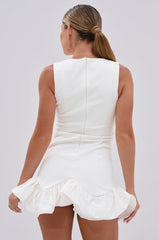 FAHARI RUFFLE HEM MINI DRESS IN WHITE
