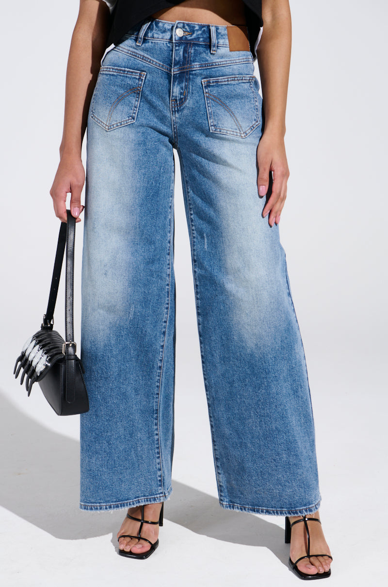 REVERSE REVERSE MEDIUM WASH JEANS