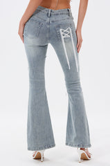 TIED UP FLARE JEANS