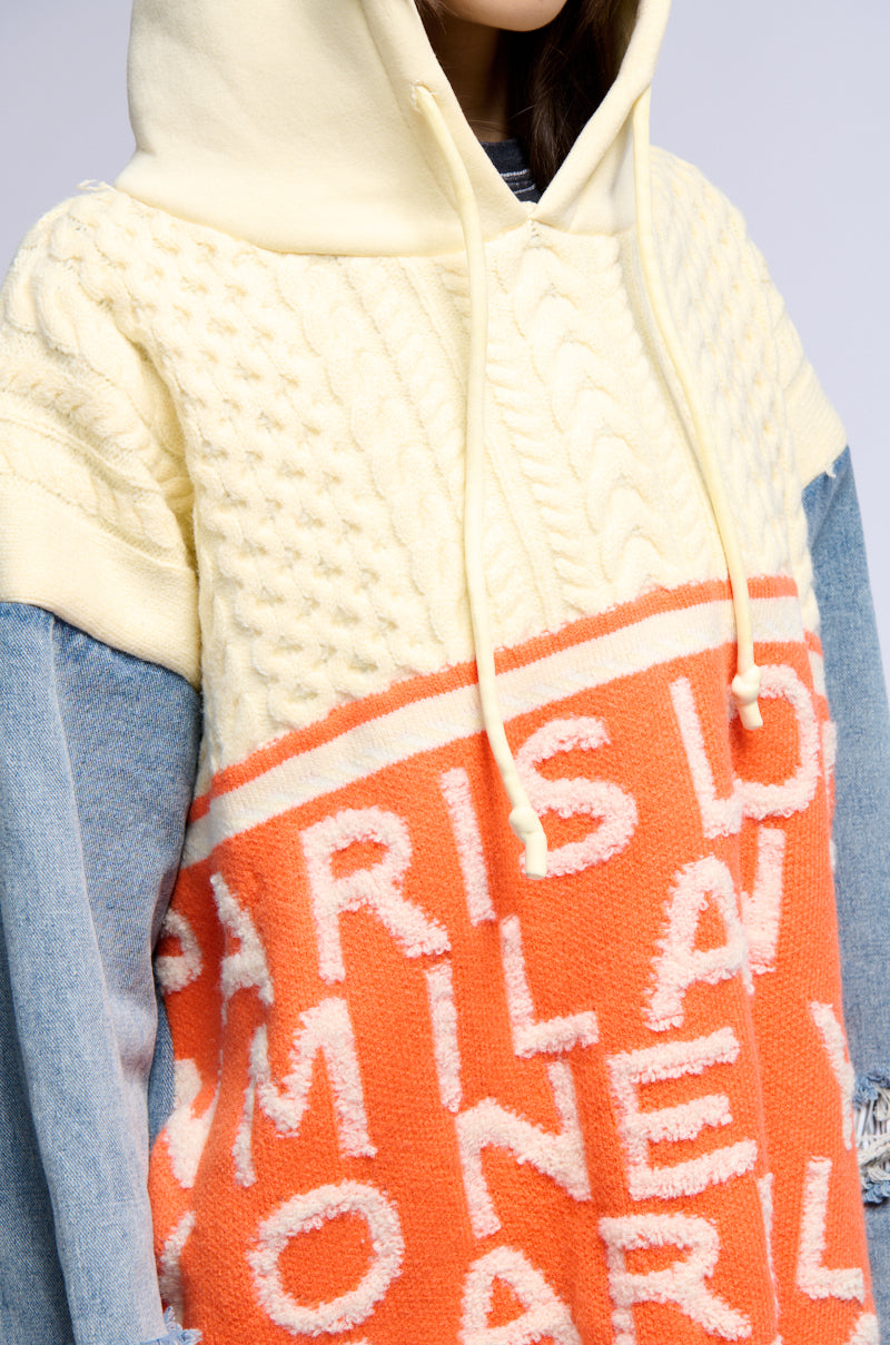 WORLD TRAVELER DENIM DETAIL SWEATER